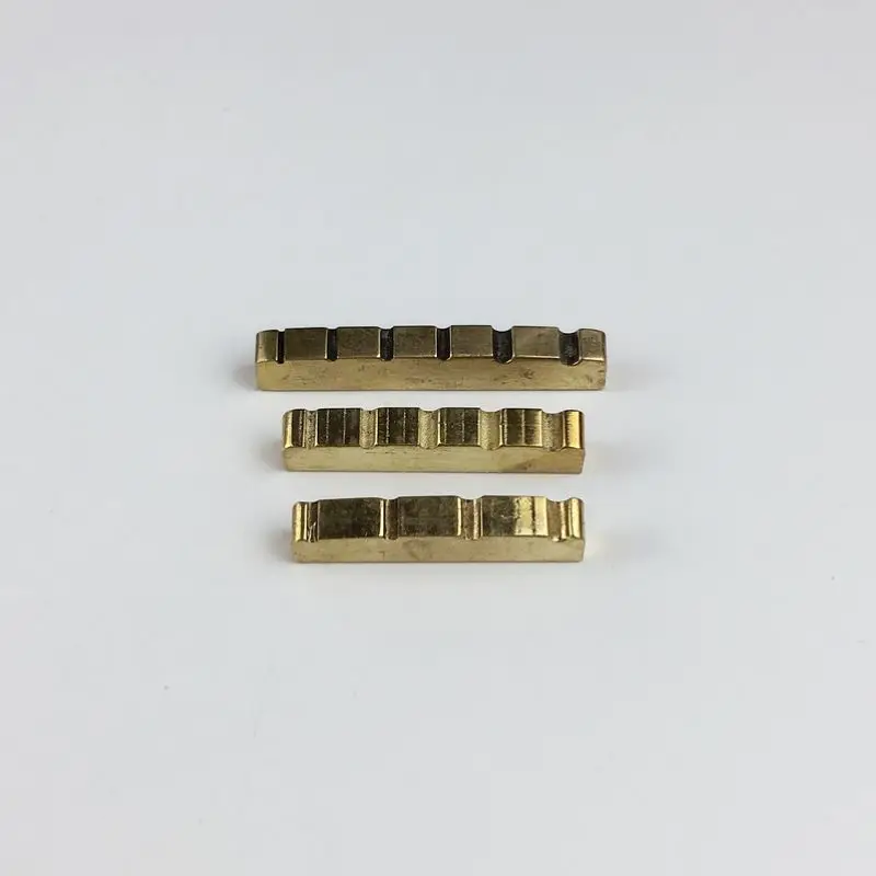 1 Piece Solid Brass Metal Electric Guitar Nut Bass Nut For ST / LP Guitars 4-string 5-string 6-string bass Guitar Parts
1 Piece Solid Brass Metal Electric Guitar Nut Bass Nut For ST / LP Guitars 4-string 5-string 6-string bass Guitar Parts