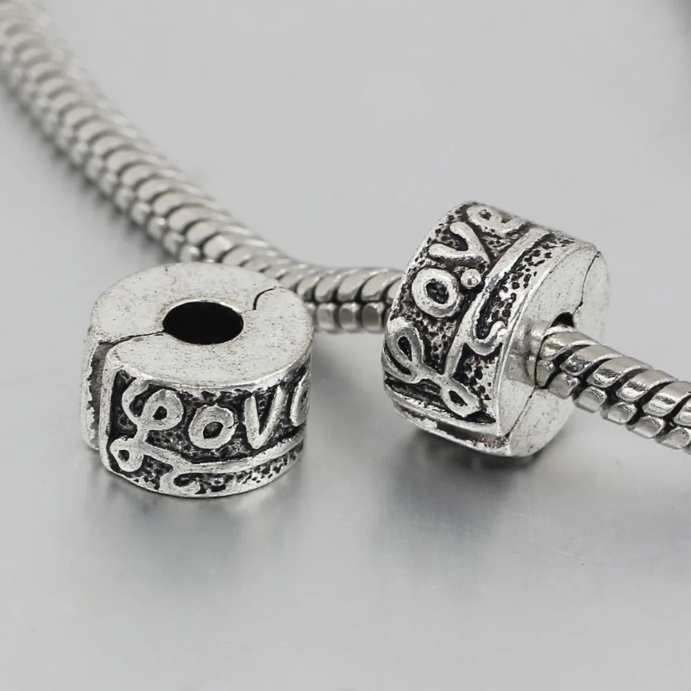 free shipping 1pc silver love clip heart stopper bead charm Fits European Charm Bracelets A163
free shipping 1pc silver love clip heart stopper bead charm Fits European Charm Bracelets A163