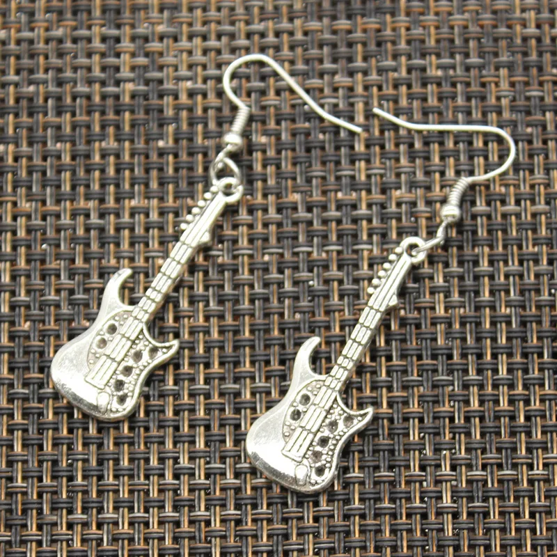 New Fashion Handmade Electic Guitar Flying Wings Skull Guitar Pendants DIY Earrings For Women Party
New Fashion Handmade Electic Guitar Flying Wings Skull Guitar Pendants DIY Earrings For Women Party