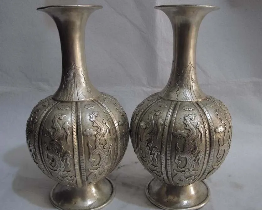 Chinese White Copper Silver Carved Lucky Feng Shui Six Dragon Jar Pot Vase Pair
Chinese White Copper Silver Carved Lucky Feng Shui Six Dragon Jar Pot Vase Pair