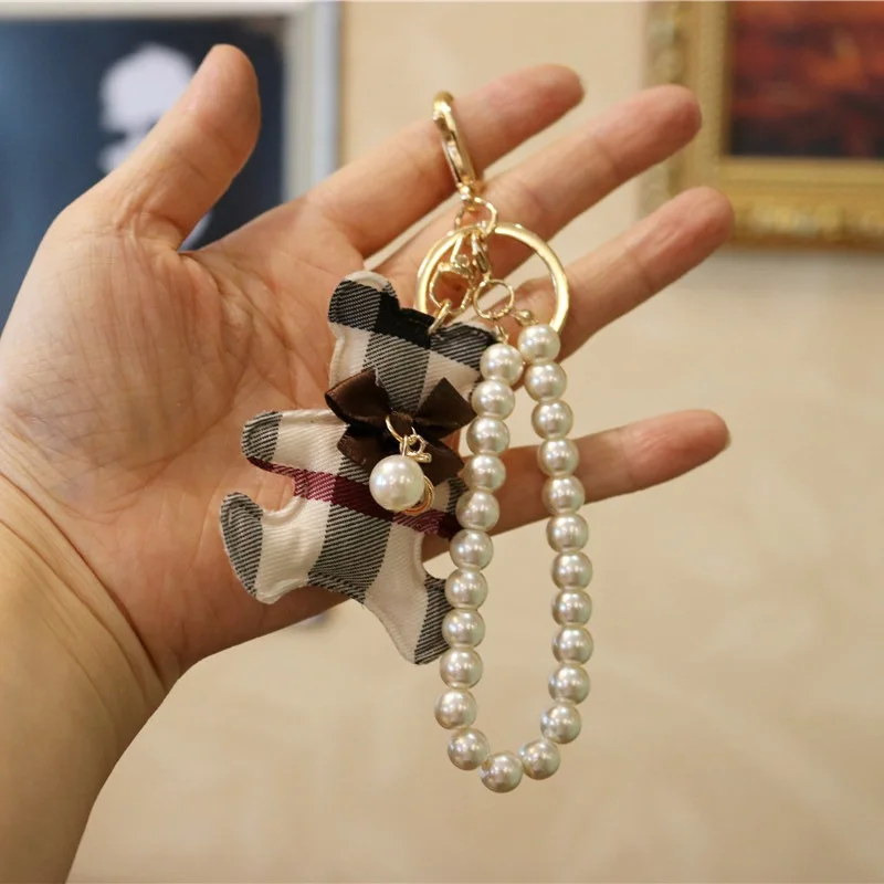 Cute Bear Pattern Car Keychain Cartoon Teddy bear Bead chain Key Ring Car Bag Keychain For Women Bag Charms Pendant
Cute Bear Pattern Car Keychain Cartoon Teddy bear Bead chain Key Ring Car Bag Keychain For Women Bag Charms Pendant