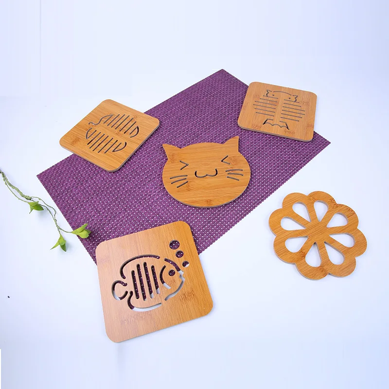 Anti-hot wood creative heat insulation pad wholesale kitchen hollow table mat non-slip bamboo cup pan
Anti-hot wood creative heat insulation pad wholesale kitchen hollow table mat non-slip bamboo cup pan