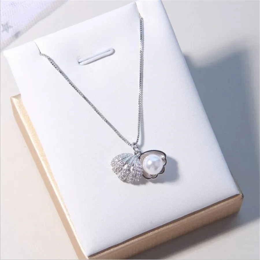 YIKUF88 925 sterling silver Shell item temperament pearl silver pendant chain necklace for women
YIKUF88 925 sterling silver Shell item temperament pearl silver pendant chain necklace for women