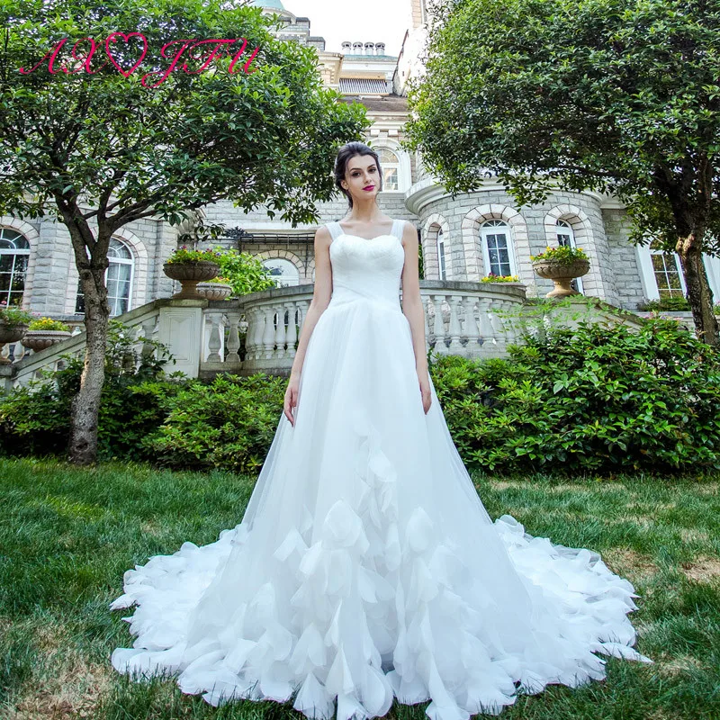 AXJFU luxury princess white wedding dress flower lace sleeveless feathers wedding dress vintage beach wedding dress 2028
AXJFU luxury princess white wedding dress flower lace sleeveless feathers wedding dress vintage beach wedding dress 2028