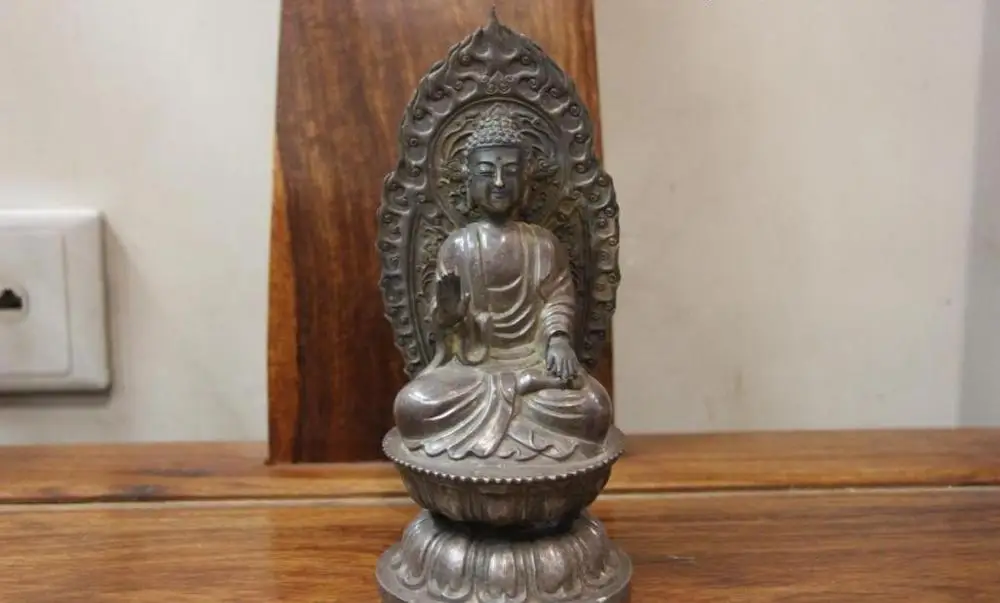 Винтаж ручной гравировкой чистого серебра Amitabha Tathagata статуя Будды Шакьямуни
Винтаж ручной гравировкой чистого серебра Amitabha Tathagata статуя Будды Шакьямуни