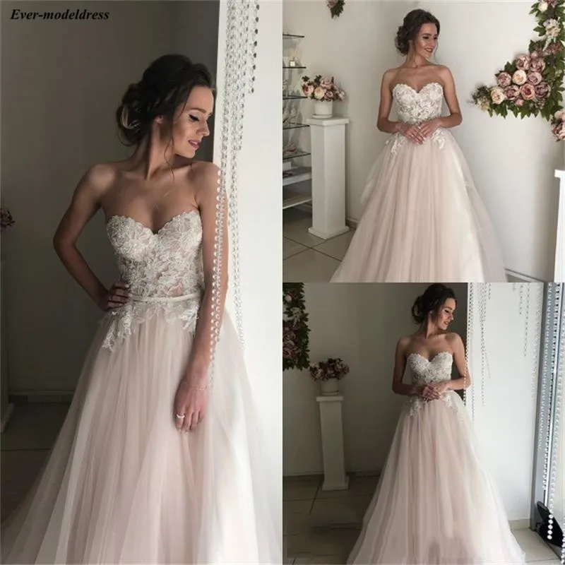 Elegant Sweetheart Tulle A-Line Wedding Dresses Lace Appliques Garden Bride Dress 2019 Sweep Train Custom Made vestidos de boda
Elegant Sweetheart Tulle A-Line Wedding Dresses Lace Appliques Garden Bride Dress 2019 Sweep Train Custom Made vestidos de boda