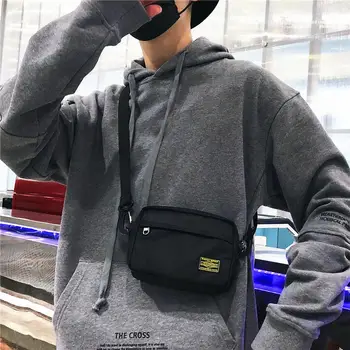 Leisure simple shoulder bag Messenger bag Chao brand mobile phone bag men Oxford hip hop street small satchel disco bag
Leisure simple shoulder bag Messenger bag Chao brand mobile phone bag men Oxford hip hop street small satchel disco bag