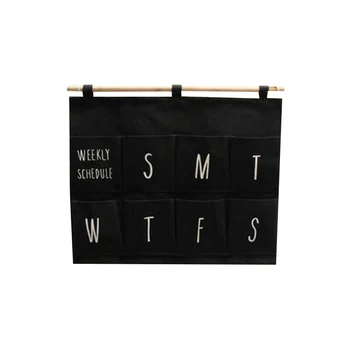 Wall hanging type sundry storage bag simple black cotton and linen fabric creative week daily finishing sorting grid hanging bag
Wall hanging type sundry storage bag simple black cotton and linen fabric creative week daily finishing sorting grid hanging bag