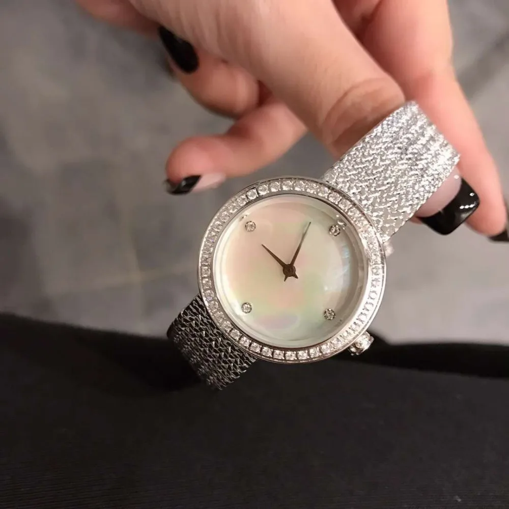 New stainless steel CUBIC Zirconia Quartz Wristwatch round White mother of pearl stone dial watch clock gift for women
New stainless steel CUBIC Zirconia Quartz Wristwatch round White mother of pearl stone dial watch clock gift for women