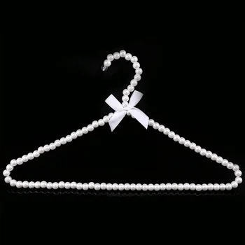 Plastic Pearl Beaded Bow Clothes Hanger Closet Space Saver Clothes Dress Coat Hangers Storage Rack Organizer Dry Rack
Plastic Pearl Beaded Bow Clothes Hanger Closet Space Saver Clothes Dress Coat Hangers Storage Rack Organizer Dry Rack