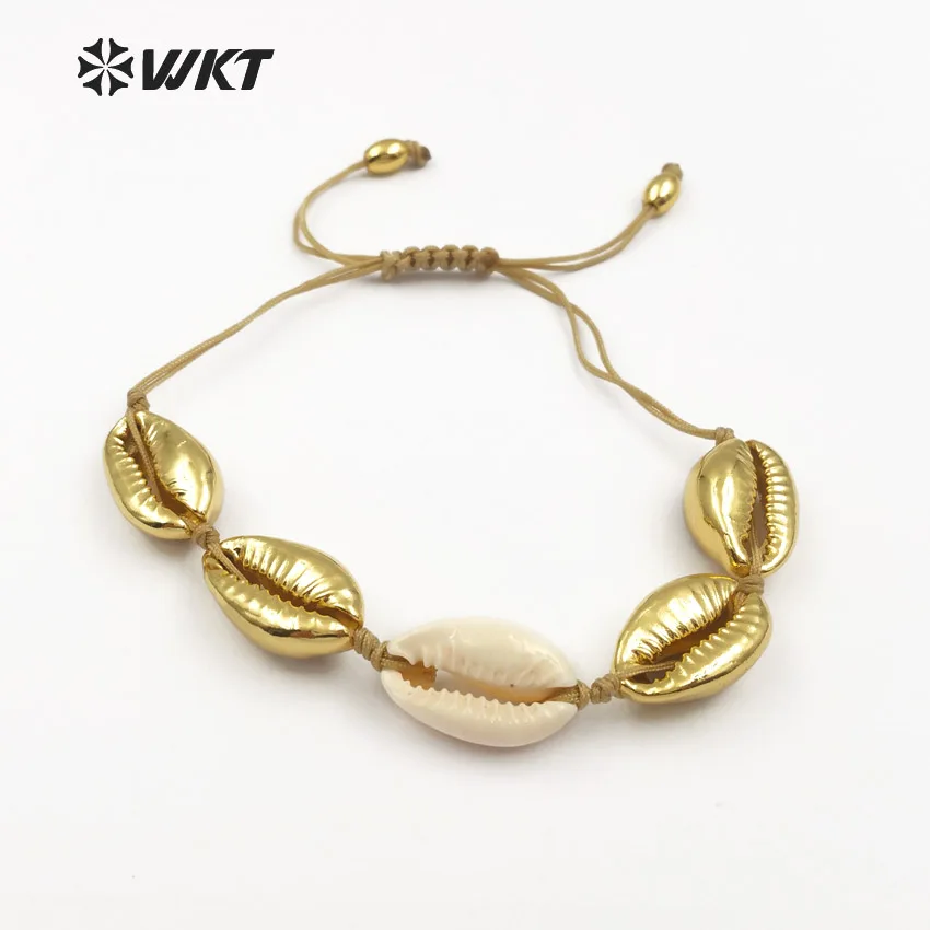WT-B432 Full Gold Dipped Cowrie Shell Bracelet With One White Shell In Natural Shell Bracelet With Cord Closure Handmade Jewelry
WT-B432 Full Gold Dipped Cowrie Shell Bracelet With One White Shell In Natural Shell Bracelet With Cord Closure Handmade Jewelry