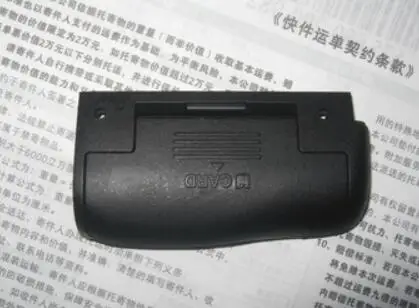 New original SD memory card door cover Chamber Lid Rubber repair parts for Nikon D7000 SLR
New original SD memory card door cover Chamber Lid Rubber repair parts for Nikon D7000 SLR