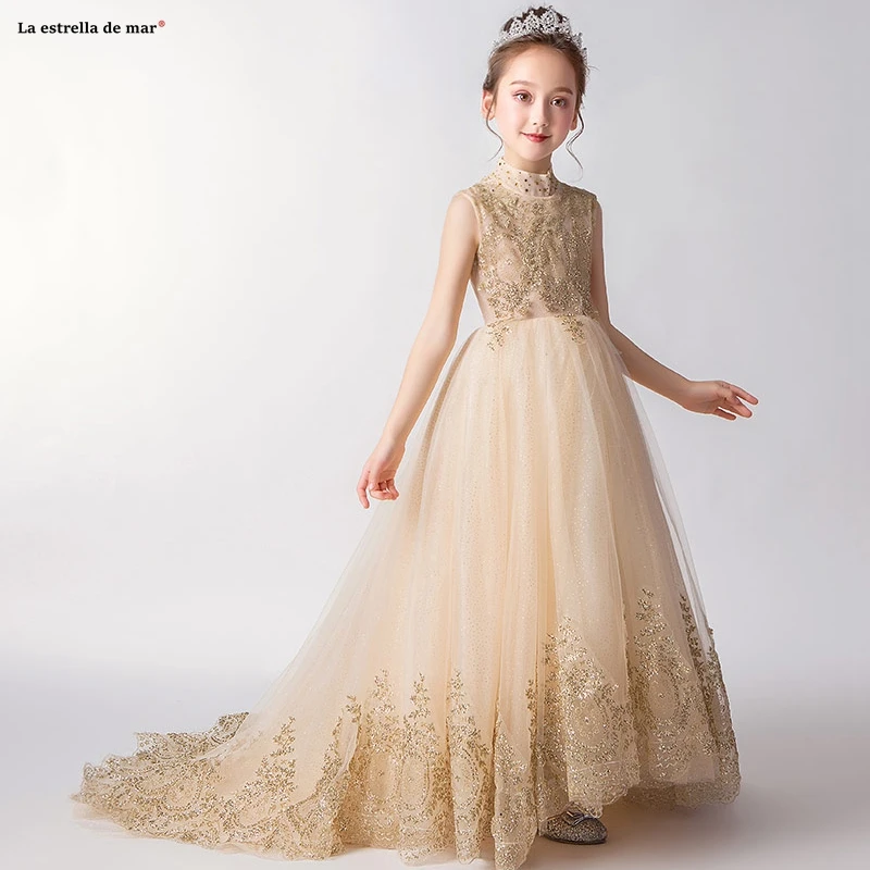 Flower girl dresses for weddings2019 new high neck tulle A Line golden flower girl dress trailing communion dresses
Flower girl dresses for weddings2019 new high neck tulle A Line golden flower girl dress trailing communion dresses