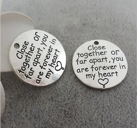 Hoting selling 10 Pieces/Lot 25mm letter printed close together or far apart you are forever in my heart charm
Hoting selling 10 Pieces/Lot 25mm letter printed close together or far apart you are forever in my heart charm