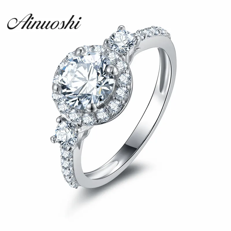 AINOUSHI Classic 1 Carat Round Cut Halo Ring SONA Engagement Ring Three Stone 925 Sterling Silver Ring Anillo De Boda
AINOUSHI Classic 1 Carat Round Cut Halo Ring SONA Engagement Ring Three Stone 925 Sterling Silver Ring Anillo De Boda