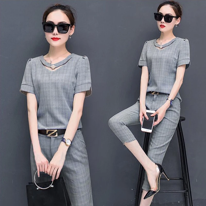 Newest summer Elegant Office Lady Business Suits Female Two Piece Sets Femme short Sleeve T-shirt and Trouser suits
Newest summer Elegant Office Lady Business Suits Female Two Piece Sets Femme short Sleeve T-shirt and Trouser suits