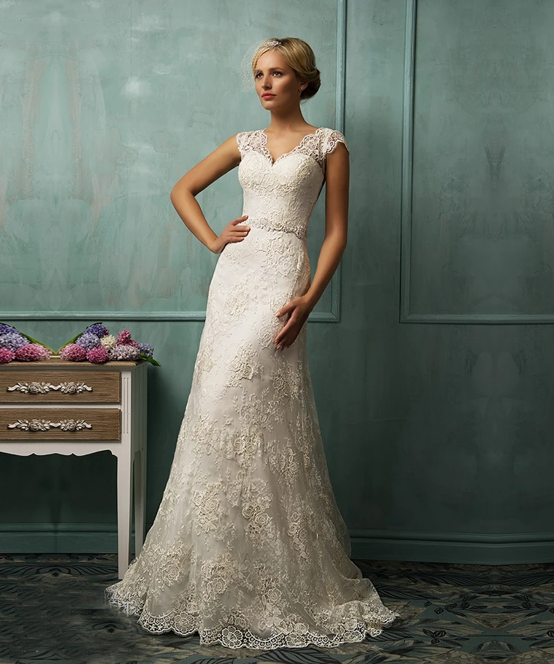 Amelia Sposa Latest V Neck Cap Sleeve Lace Gown Covered White Bridal Gowns With Applique Beads Mermaid Wedding Dress 2016
Amelia Sposa Latest V Neck Cap Sleeve Lace Gown Covered White Bridal Gowns With Applique Beads Mermaid Wedding Dress 2016