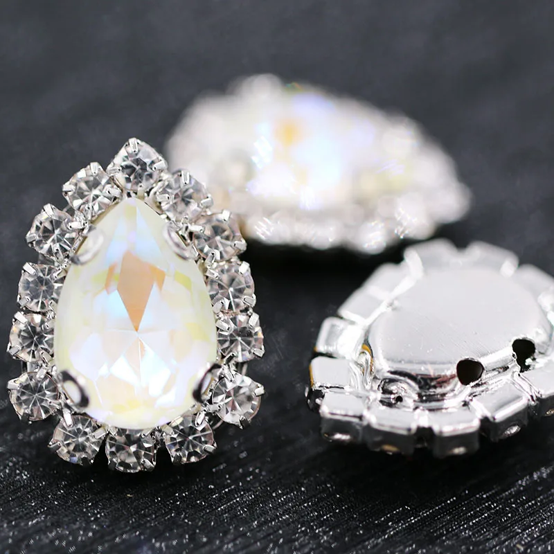 Hot glass rhinestones teardrop shape sew on Sliver base crystal button White fluorescence crystals rhinestones for garment/dress
Hot glass rhinestones teardrop shape sew on Sliver base crystal button White fluorescence crystals rhinestones for garment/dress