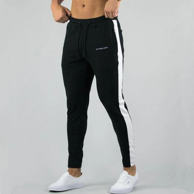 2019 Autumn Men Fitness Sweatpants male gyms Bodybuilding workout cotton trousers Casual fashion sportswear Brand Pencil pants
2019 Autumn Men Fitness Sweatpants male gyms Bodybuilding workout cotton trousers Casual fashion sportswear Brand Pencil pants
