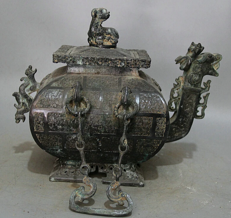Collectible bronze S1534 14" Ancient China dynasty Bronze Dragon Beast handle teapot Wine Tea Pot Flagon
Collectible bronze S1534 14" Ancient China dynasty Bronze Dragon Beast handle teapot Wine Tea Pot Flagon