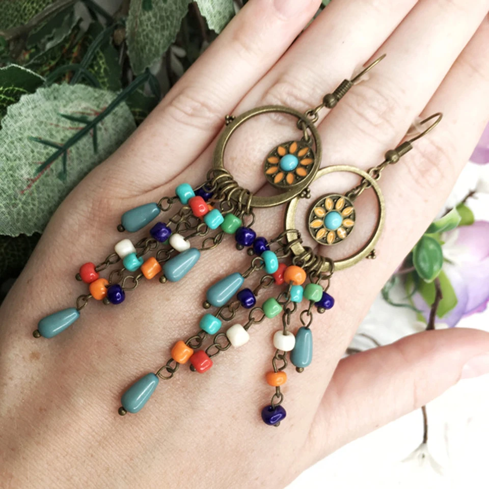 Bohemian long acrylic beads tassel drop earrings jewelry 2018 Boho ethnic round sun flower pendant dangle earrings for women
Bohemian long acrylic beads tassel drop earrings jewelry 2018 Boho ethnic round sun flower pendant dangle earrings for women