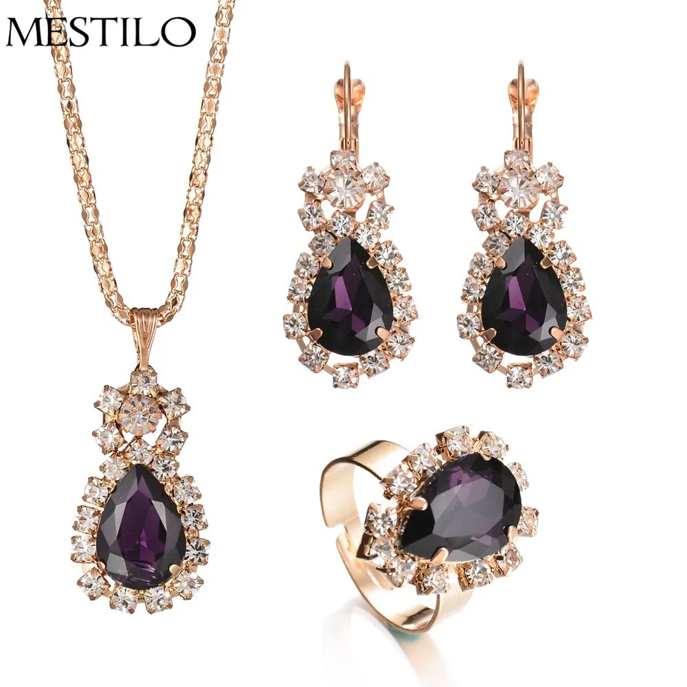 MESTILO Nigerian Luxury Gold Crystal Water Drop Earrings Necklaces Pendants Adjustable Ring For Women Fashion Dubai Jewelry Sets
MESTILO Nigerian Luxury Gold Crystal Water Drop Earrings Necklaces Pendants Adjustable Ring For Women Fashion Dubai Jewelry Sets
