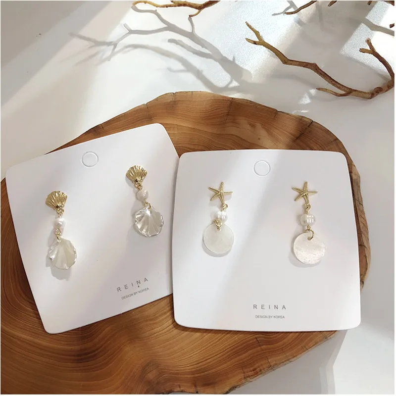 Japan Korea Earrings Pearl Starfish Shell Geometry Pendant Fashion Women Ear Rings 2019 Vintage Baroque Bohemian Ornaments
Japan Korea Earrings Pearl Starfish Shell Geometry Pendant Fashion Women Ear Rings 2019 Vintage Baroque Bohemian Ornaments