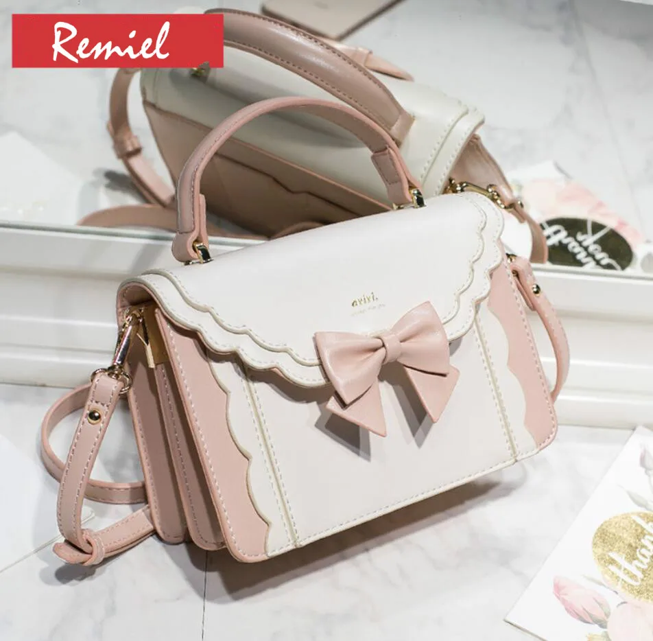 Luxury Brand Female Tote bag 2019 Fashion New Quality Leather Women's Designer Handbag Cute Bow Hit color Shoulder Messenger bag
Luxury Brand Female Tote bag 2019 Fashion New Quality Leather Women's Designer Handbag Cute Bow Hit color Shoulder Messenger bag