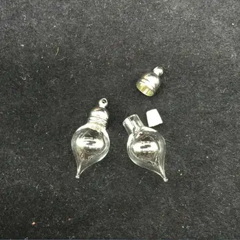 50pieces 27x11mm tear water drop glass vial pendant glass pendant mini wishing glass bottle necklace pendant jewelry findings 
50pieces 27x11mm tear water drop glass vial pendant glass pendant mini wishing glass bottle necklace pendant jewelry findings