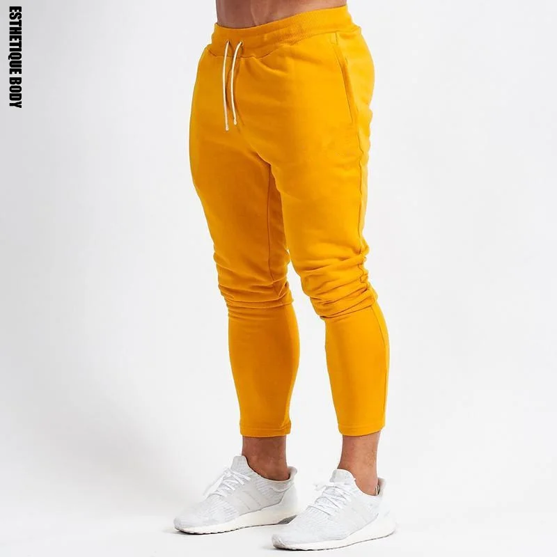 2019 Joggers Gym Trousers Mens Workout Running Tights Sweatpants cotton Solid color Soccer pants Bodybuilding Skinny trousers
2019 Joggers Gym Trousers Mens Workout Running Tights Sweatpants cotton Solid color Soccer pants Bodybuilding Skinny trousers