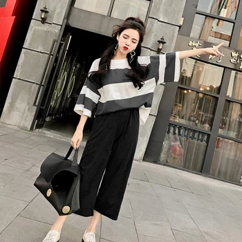 2019 New Korean Batwing Sleeve Stripe Loose Two Piece Set Wide Leg Pants Casual Sets Preppy Style Women Clothes 2 Pcs Set
2019 New Korean Batwing Sleeve Stripe Loose Two Piece Set Wide Leg Pants Casual Sets Preppy Style Women Clothes 2 Pcs Set