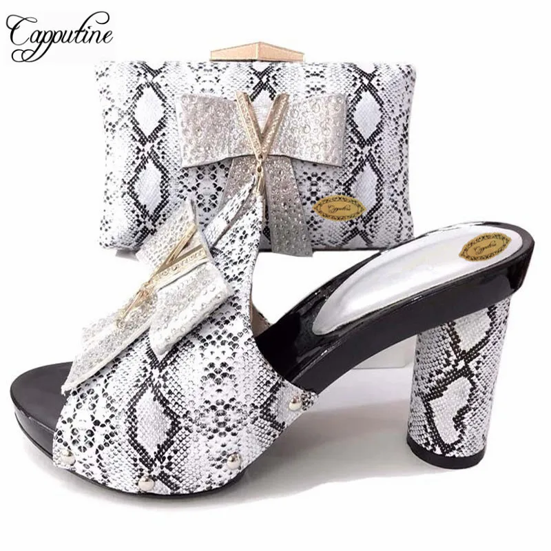 Nigerian Fashion Rhinestone Ladies Shoes And Bag Set Italian Style Shoes With Matching Bags For Party 7Colors On Sale TX-699
Nigerian Fashion Rhinestone Ladies Shoes And Bag Set Italian Style Shoes With Matching Bags For Party 7Colors On Sale TX-699