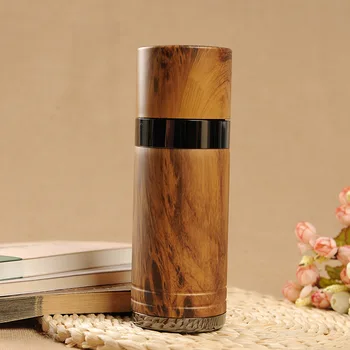 330ml Creative pear wood tea thermos bottle zinc alloy purple sand inner magnetic insulation kettle Vacuum Flasks Free shiping
330ml Creative pear wood tea thermos bottle zinc alloy purple sand inner magnetic insulation kettle Vacuum Flasks Free shiping