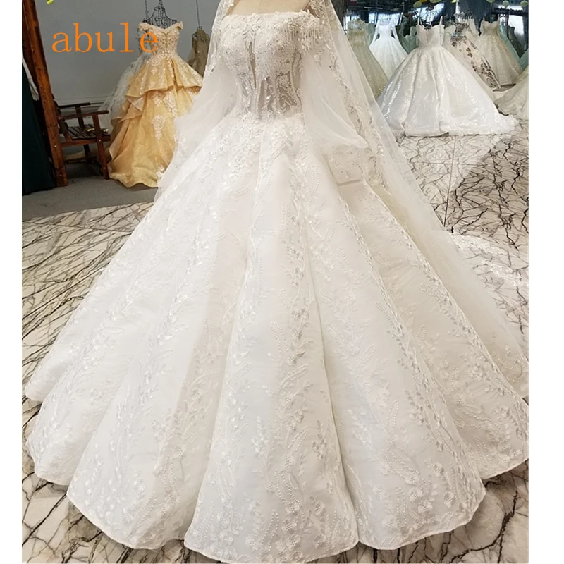 Illusion wedding dress lace up boat neck big puffy ball gowns ruffles appliques beads bride wedding gowns 2018 best seller
Illusion wedding dress lace up boat neck big puffy ball gowns ruffles appliques beads bride wedding gowns 2018 best seller