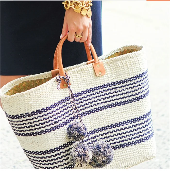 2018 European and American tide models handmade bohemian holiday striped pompom straw bag handbag holiday beach bag
2018 European and American tide models handmade bohemian holiday striped pompom straw bag handbag holiday beach bag