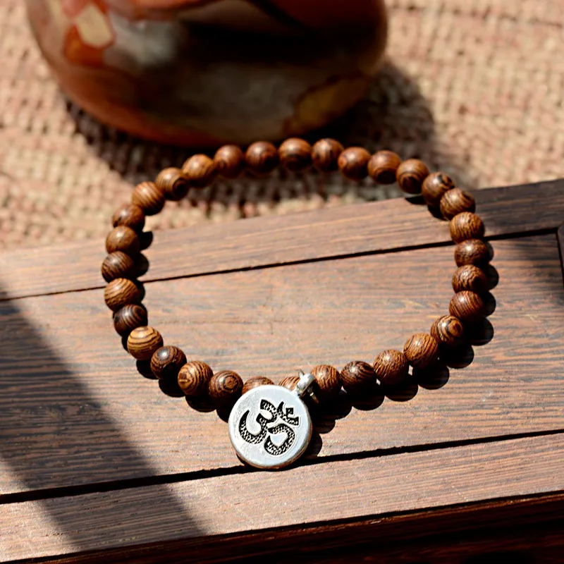 2019 6MM OM Natural Wood Beads Bracelets Women Ethnic Lotus Silver Pendant Buddhism Bracelet Prayer Jewelry Yoga Bracelet Homme
2019 6MM OM Natural Wood Beads Bracelets Women Ethnic Lotus Silver Pendant Buddhism Bracelet Prayer Jewelry Yoga Bracelet Homme
