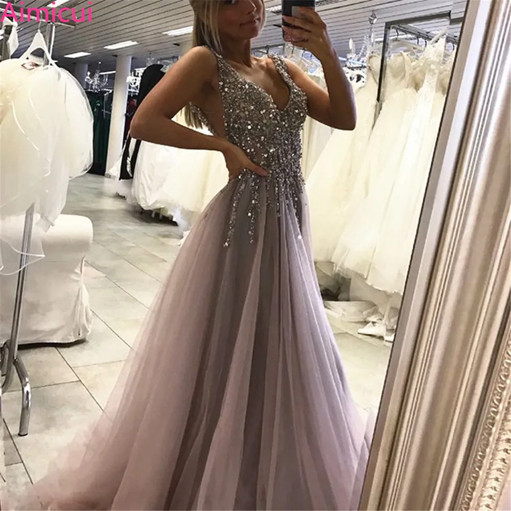 Hot Selling Sliver Crystals Tulle Evening Dress 2019 Backless High Split Charming Summer Prom Gowns Custom Made Party Dresses
Hot Selling Sliver Crystals Tulle Evening Dress 2019 Backless High Split Charming Summer Prom Gowns Custom Made Party Dresses