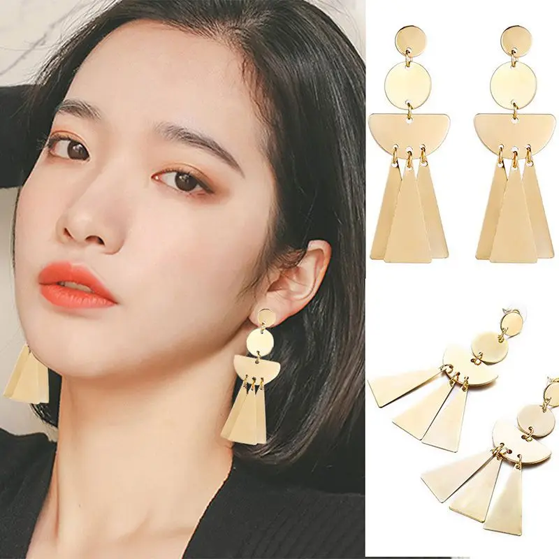 Bohemian Retro Ethnic Style Earrings Temperament Engraved Triangle Metal Disc Fan-Shaped Tassel Alloy Earrings for Women Jewelry
Bohemian Retro Ethnic Style Earrings Temperament Engraved Triangle Metal Disc Fan-Shaped Tassel Alloy Earrings for Women Jewelry
