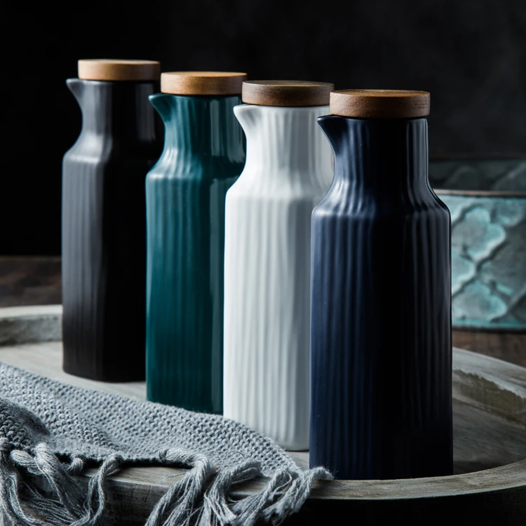 Ceramic matte color Olive Oil Soy Sauce Vinegar bottle with wood lid Seasoning storage for kitchen tools
Ceramic matte color Olive Oil Soy Sauce Vinegar bottle with wood lid Seasoning storage for kitchen tools