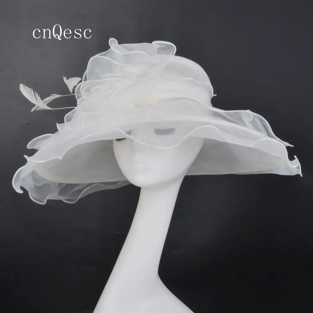 2019 Ivory Women Derby hat organza hat with feathers&organza flower for Church Races.
2019 Ivory Women Derby hat organza hat with feathers&organza flower for Church Races.