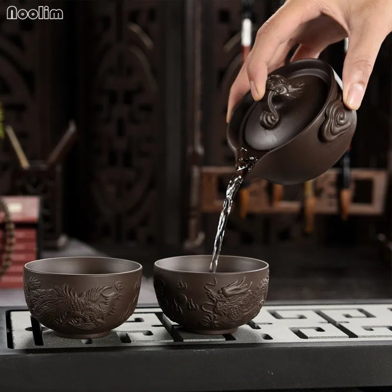 NOOLIM Yixing Purple Clay One Teapot with Two Tea Cups Set Portable Travel Tea Set Chinese Kung Fu Tea Set Drinkware
NOOLIM Yixing Purple Clay One Teapot with Two Tea Cups Set Portable Travel Tea Set Chinese Kung Fu Tea Set Drinkware