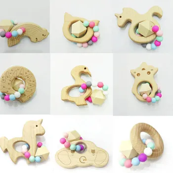 1PC Silicone+Wooden Teether Chewable Silicone Pendants Safe And Natual Baby Toy Baby Teether
1PC Silicone+Wooden Teether Chewable Silicone Pendants Safe And Natual Baby Toy Baby Teether