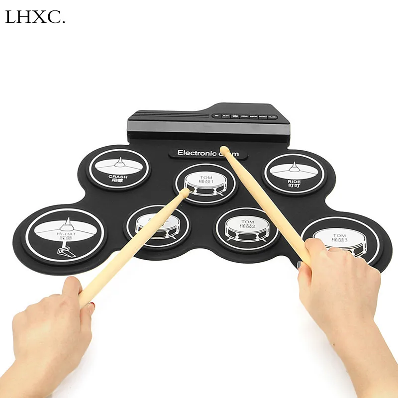 Electric Drum Pad Kit With DrumSticks Foot Pedal Portable Electronic Drum Digital USB 7 Pads Roll Up Drum Set Silicone Drum
Electric Drum Pad Kit With DrumSticks Foot Pedal Portable Electronic Drum Digital USB 7 Pads Roll Up Drum Set Silicone Drum
