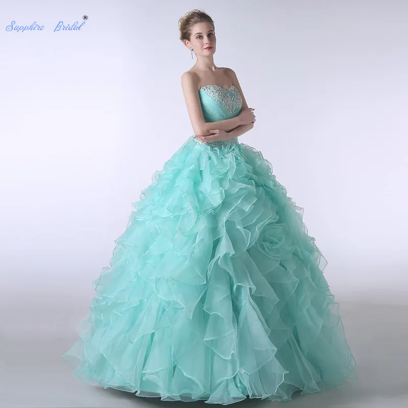 Sapphire Bridal Mint Green Appliques Ruffles Party Gowns Vestido De 15 Anos De Beading Back Strap Ball Gown Quinceanera Dress
Sapphire Bridal Mint Green Appliques Ruffles Party Gowns Vestido De 15 Anos De Beading Back Strap Ball Gown Quinceanera Dress