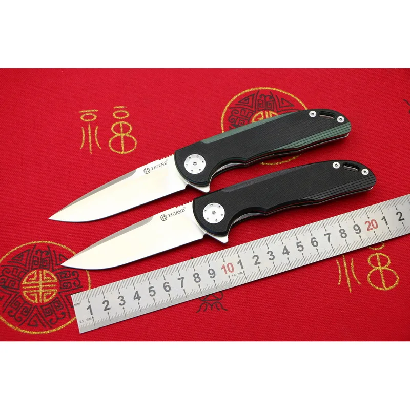 TIGEND CF1010 Flipper folding knife D2 blade G10 + steel handle camping hunting outdoor survival pocket Kitchen knives EDC tools
TIGEND CF1010 Flipper folding knife D2 blade G10 + steel handle camping hunting outdoor survival pocket Kitchen knives EDC tools