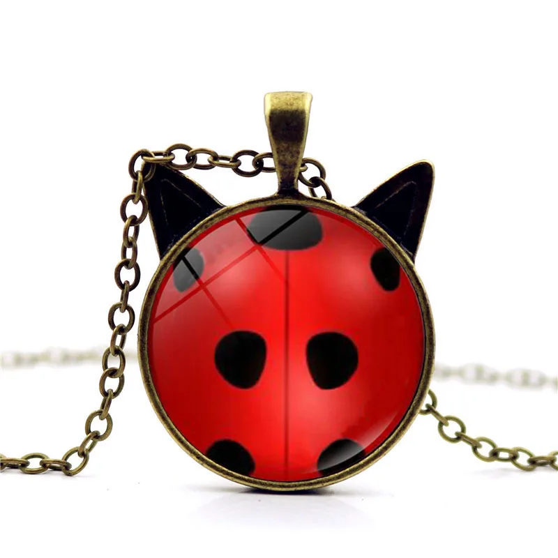 Miraculous Ladybugs Cat Ears Pendant Necklace Glass Dome Anime Jewelry Silver Black Bronze Chain Necklace Women Lovely Gifts
Miraculous Ladybugs Cat Ears Pendant Necklace Glass Dome Anime Jewelry Silver Black Bronze Chain Necklace Women Lovely Gifts