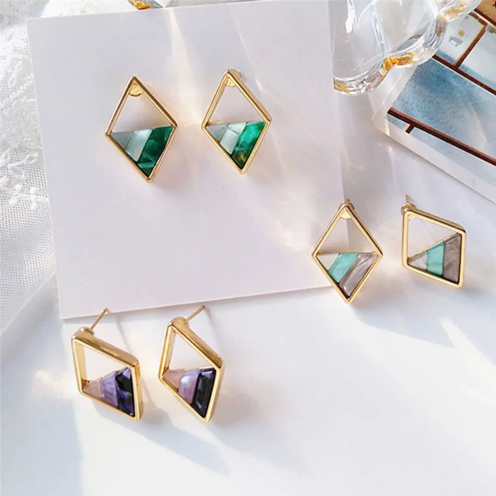 Contracted Lozenge Color Contrast Color Earrings Female Fashion Lady Geometric Hollow Out the Triangle Stud Earring
Contracted Lozenge Color Contrast Color Earrings Female Fashion Lady Geometric Hollow Out the Triangle Stud Earring