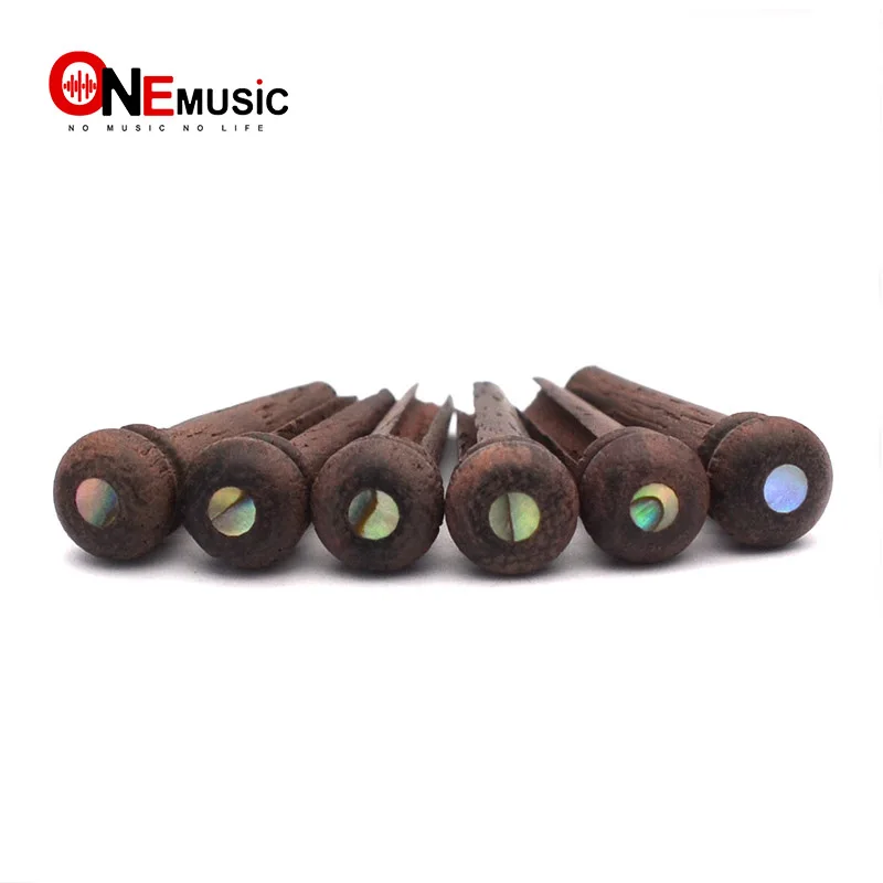 6pcs Rosewood Guitar Bridge Pins with 2.0mm Green Pearl Shell Dot Guitar Pressure String Nails Pin
6pcs Rosewood Guitar Bridge Pins with 2.0mm Green Pearl Shell Dot Guitar Pressure String Nails Pin
