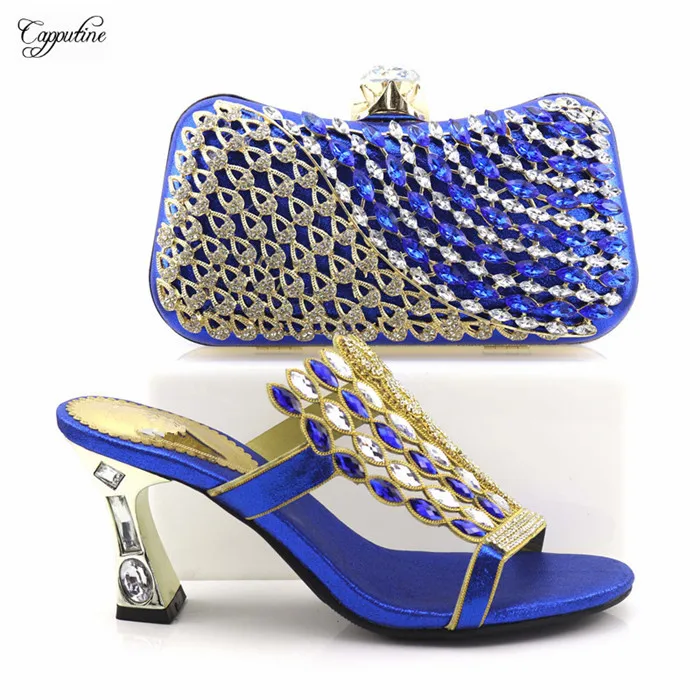 Fashion royal blue sandal shoes and clutch handbag set with shinning crystal stones T0745, heel height 8cm
Fashion royal blue sandal shoes and clutch handbag set with shinning crystal stones T0745, heel height 8cm