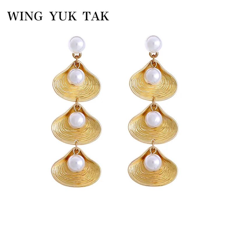 wing yuk tak Alloy Shell Earrings For Women Unique Design Simulated Pearl Statement Drop Earring Fashion Jewelry Accessories
wing yuk tak Alloy Shell Earrings For Women Unique Design Simulated Pearl Statement Drop Earring Fashion Jewelry Accessories